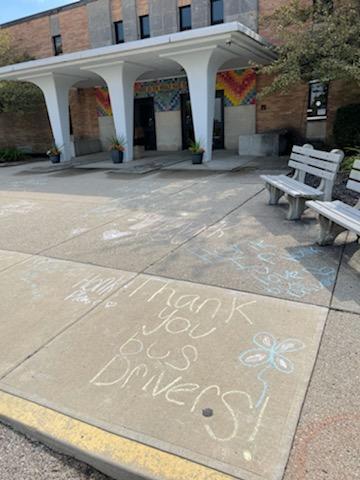 Sidewalk chalk art expresses appreciation for bus drivers