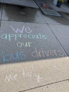 Sidewalk chalk art expresses appreciation for bus drivers