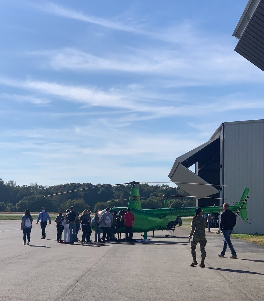 Students tour helicopter and hangar 