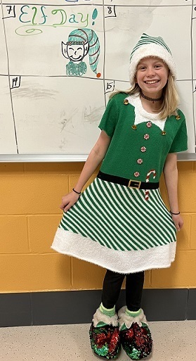Elf Day- girl in green elf costume