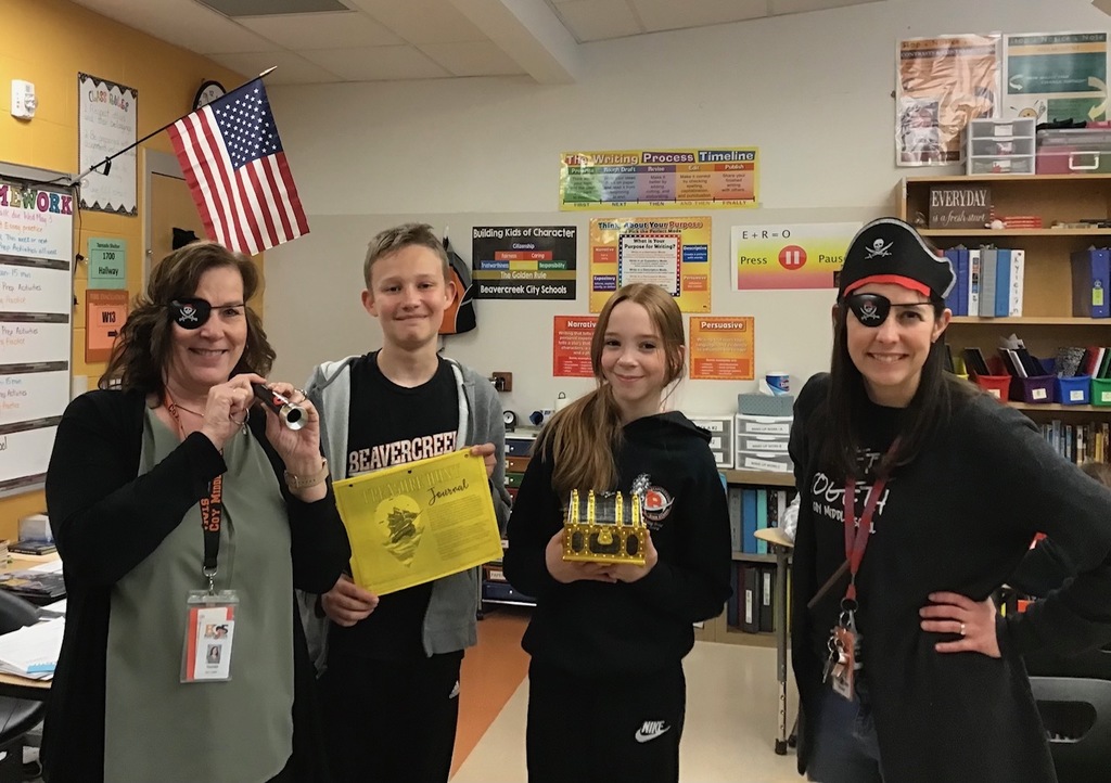 two teachers and the winning two students for the OST prep Treasure Hunt event